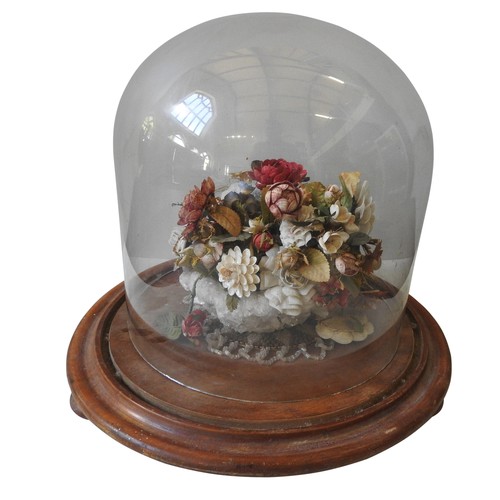 315 - A VICTORIAN SHELL WORK FLORAL CENTREPIECE, in a Quartz crystal basket, on a wooden stand with associ... 