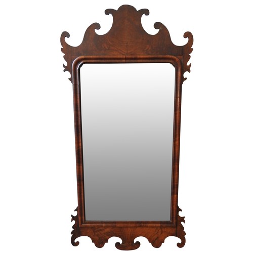 218 - A GEORGE III WALNUT FRET CUT WALL MIRROR, 90 x 44 cm