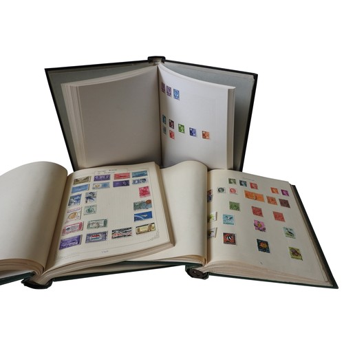 319 - A COLLECTION OF THREE STAMP ALBUMS INCLUDING A VICTORIAN PENNY RED AND OTHERS