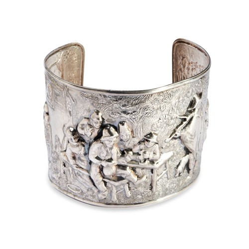 130 - A CONTINENTAL SILVER BANGLE chased and embossed with a jovial gathering of people. Total weight 44.6... 