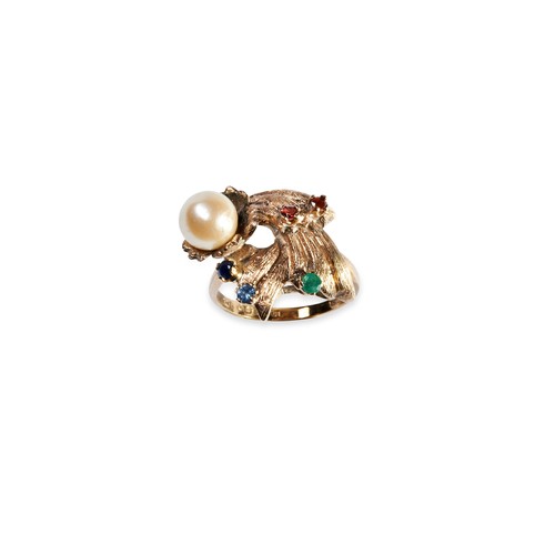 79 - A CULTURED PEARL, SAPPHIRE, EMERALD AND RUBY RING, CIRCA 1970 the cultured pearl high claw set above... 