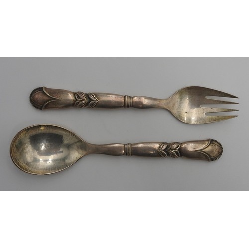 461 - A GEORG JENSEN STERLING SILVER PATTERN 57 SALAD SERVING SET, comprising of serving spoon and serving... 