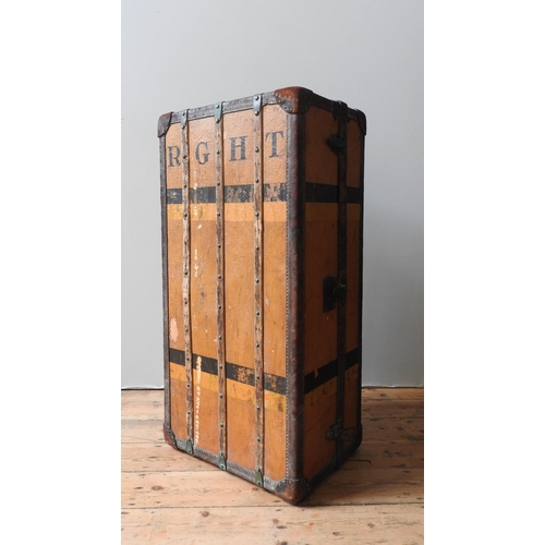 124 - A VINTAGE LOUIS VUITTON ORANGE VUITTONITE WARDROBE TRUNK, canvas with wooden battens, fitted interio... 