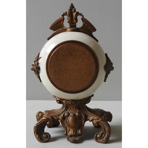 165 - A CERAMIC THISTLE PAINTED DESK CLOCK, of globular form with rococo style gilt metal mounts and base,... 