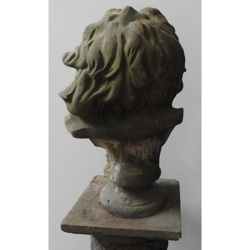 113 - A RECONSTITUTED STONE BUST OF ZEUS ON CORINTHIAN STYLE PILLAR, good weathered aappearance, the pilla... 