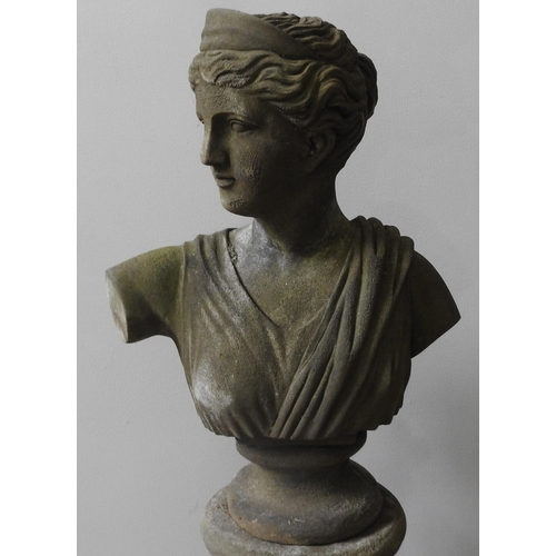 114 - A RECONSTITUTED STONE BUST OF GRECO ROMAN MAIDEN ON PILLAR, weathered appearance, the pillar splits ... 