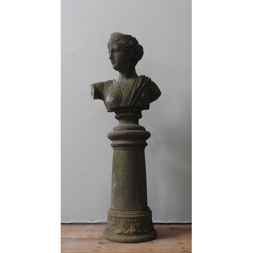 114 - A RECONSTITUTED STONE BUST OF GRECO ROMAN MAIDEN ON PILLAR, weathered appearance, the pillar splits ... 