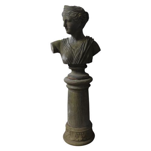 114 - A RECONSTITUTED STONE BUST OF GRECO ROMAN MAIDEN ON PILLAR, weathered appearance, the pillar splits ... 