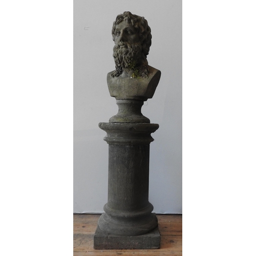 115 - A RECONSTITUTED STONE BUST OF ROMAN STYLE FIGURE ON PILLAR, weathered appearance, the roman style pi... 