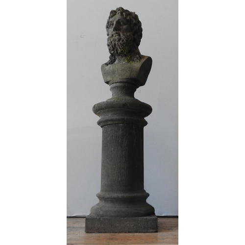 115 - A RECONSTITUTED STONE BUST OF ROMAN STYLE FIGURE ON PILLAR, weathered appearance, the roman style pi... 