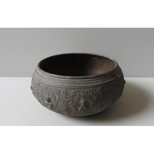 130 - AN INDIAN BRASS TIMURID-STYLE BOWL, with ornate floral and figure decorated engraving, 27 cm diamete... 