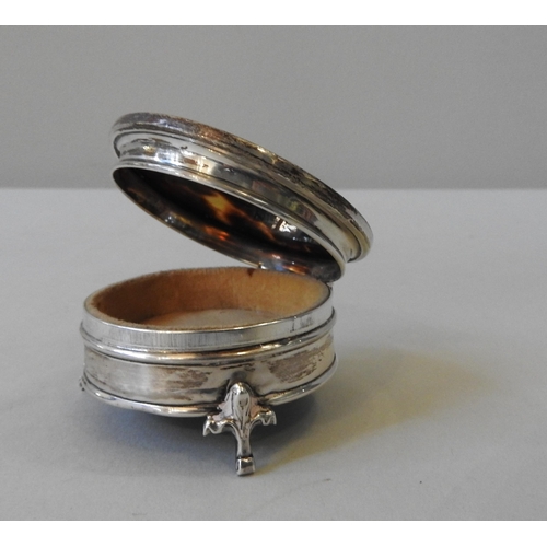 447 - A VINTAGE SILVER & TORTOISE SHELL RING BOX, the circular box with wreath & scroll decoration... 