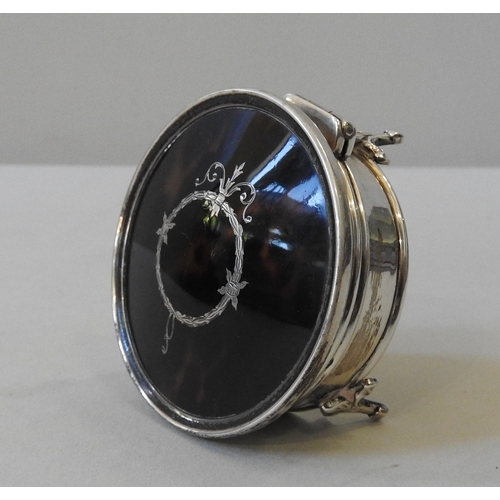 447 - A VINTAGE SILVER & TORTOISE SHELL RING BOX, the circular box with wreath & scroll decoration... 