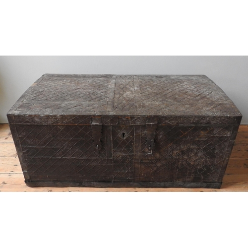 63 - A 19TH CENTURY CONTINENTAL METAL COVERED PINE STORAGE TRUNK, the metal covering with a lattice patte... 