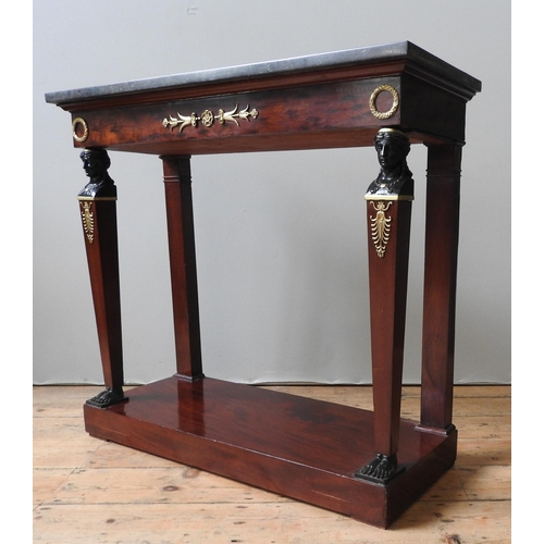 65 - A FRENCH MARBLE TOP CONSOLE TABLE, in the Empire style, the frieze decorated with gilt metal wreaths... 