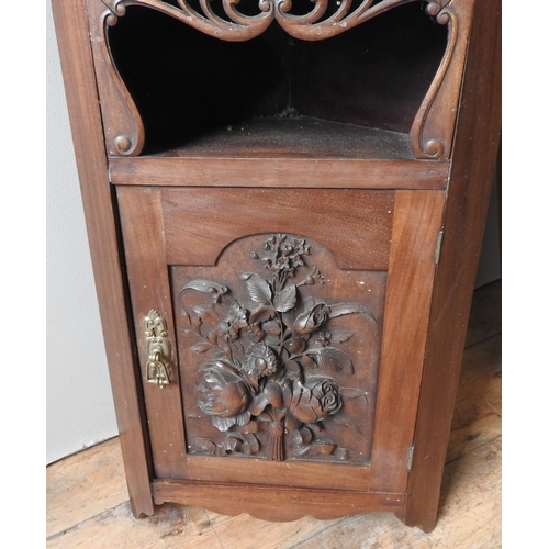 67 - A MAHOGANY ART NOUVEAU CARVED CORNER WALL CABINET AND A SIMILAR CABINET, the art nouveau cabinet car... 