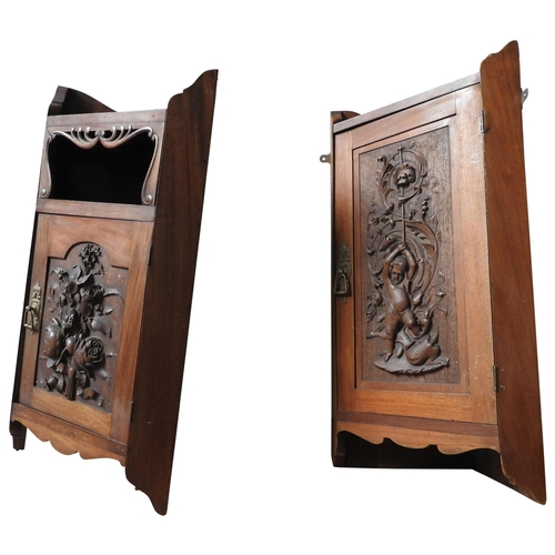 67 - A MAHOGANY ART NOUVEAU CARVED CORNER WALL CABINET AND A SIMILAR CABINET, the art nouveau cabinet car... 