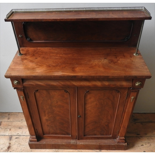 68 - AN EARLY 19TH CENTURY WALNUT CHIFFONIER, with a galleried shelf supported by brass rope twist pillar... 