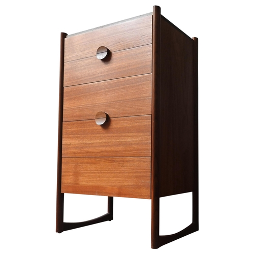 69 - A RETRO TEAK CHEST OF FIVE DRAWERS, circa 1970, with unusual circular split handles, supported on tw... 