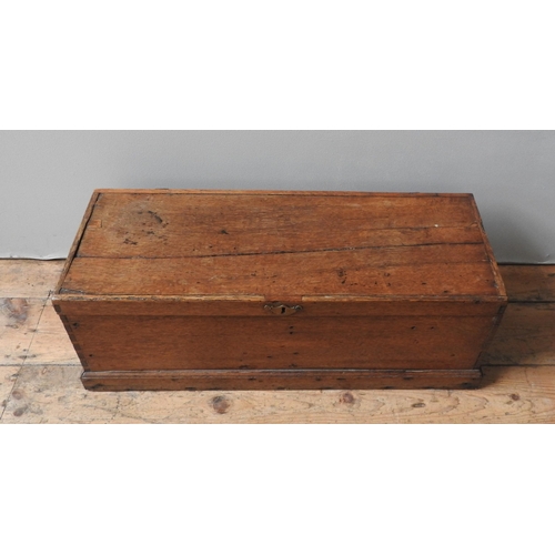 72 - A 19TH CENTURY OAK STORAGE BOX, of small proportions, with brass escutcheon, 29 x 79 x 29 cm