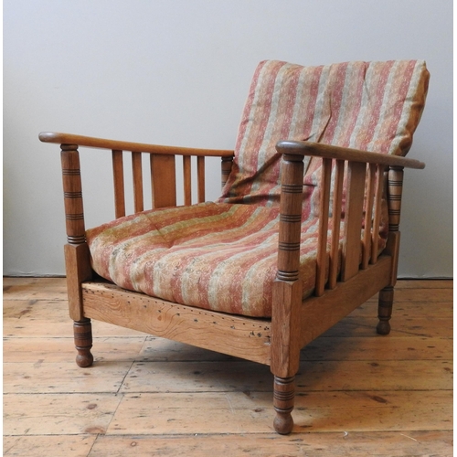 73 - TWO SHOOLBRED WOODEN ARTS & CRAFTS ARMCHAIRS, one with a horse hair filled cushion