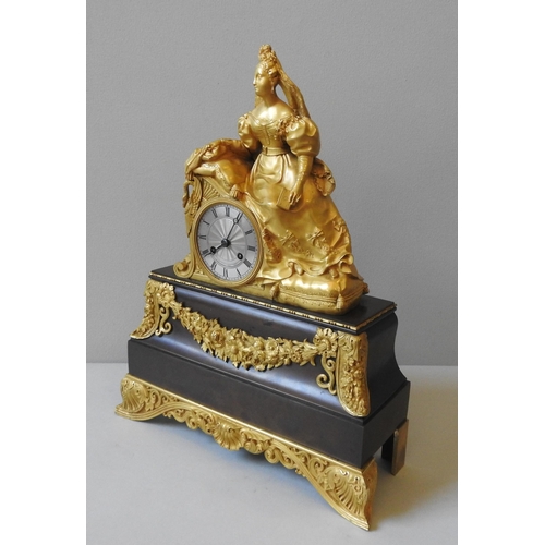 169 - A 19TH CENTURY GILT & PATINATED BRONZE MANTEL CLOCK, in the Directoire style, with an engine tur... 