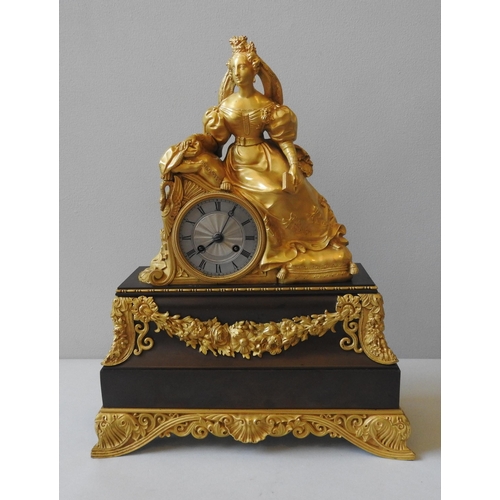 169 - A 19TH CENTURY GILT & PATINATED BRONZE MANTEL CLOCK, in the Directoire style, with an engine tur... 