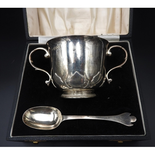 459 - A SILVER PORRINGER WITH ASSOCIATED TREFID SPOON, with a fitted case, the porringer London, 1810, the... 