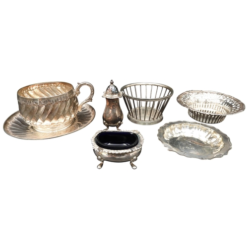 450 - A CONTINENTAL WHITE METAL CUP AND SAUCER, along with a continental white metal basket, two silver di... 