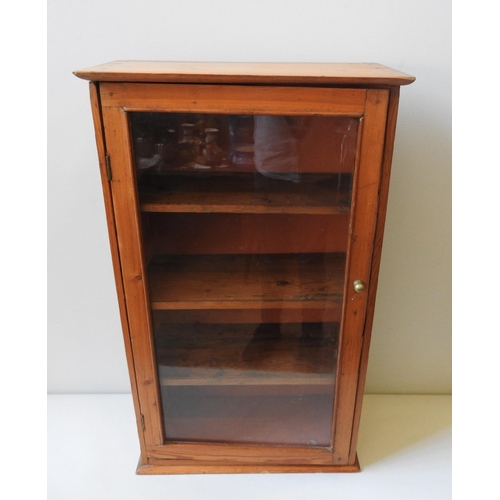 78 - A 19TH CENTURY PINE APOTHECARY CABINET, with glazed door and three interior shelves, 79 x 48 x 26 cm