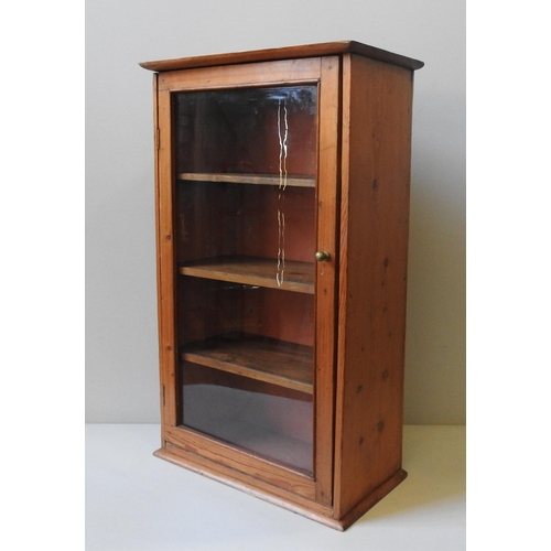 78 - A 19TH CENTURY PINE APOTHECARY CABINET, with glazed door and three interior shelves, 79 x 48 x 26 cm