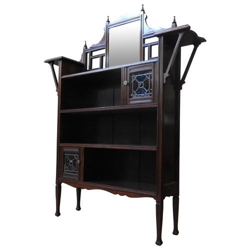 79 - A LATE 19TH CENTURY MAHOGANY FOUR TIER BOOKSHELF, in the Aesthetic style, with mirrored back top fla... 