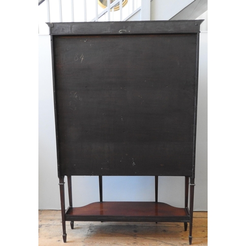 80 - A LATE 19TH CENTURY MAHOGANY INLAID BREAKFRONT VITRINE, with curved glass panels and two interior sh... 