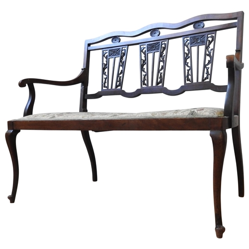 82 - A 19TH CENTURY MAHOGANY SALON SEAT, the back comprising of a serpentine top rail, three pierced carv... 