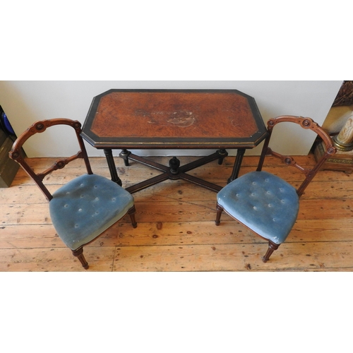 83 - A VICTORIAN WALNUT EBONISED SIDE TABLE, the canted corner top raised on four fluted legs united by a... 