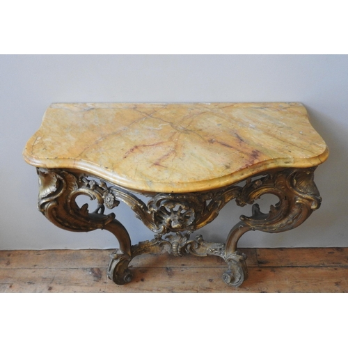 87 - A LATE 18TH / EARLY 19TH CENTURY GILT WOOD MARBLE TOP CONSOLE TABLE, comprising of a veriagated serp... 