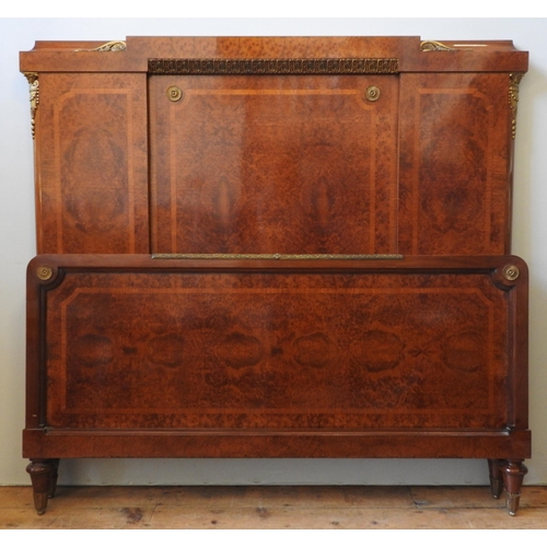 92 - A 19TH CENTURY BURR WALNUT CONTINENTAL BED STEAD, in the Empire style, comprising of headboard, foot... 