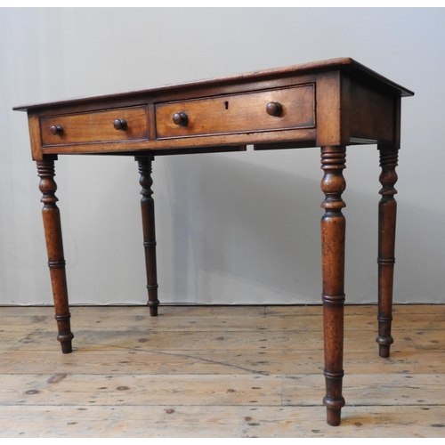 108 - A VICTORIAN MAHOGANY SIDE TABLE, with a moulded rectangular top and two frieze drawers, on four turn... 