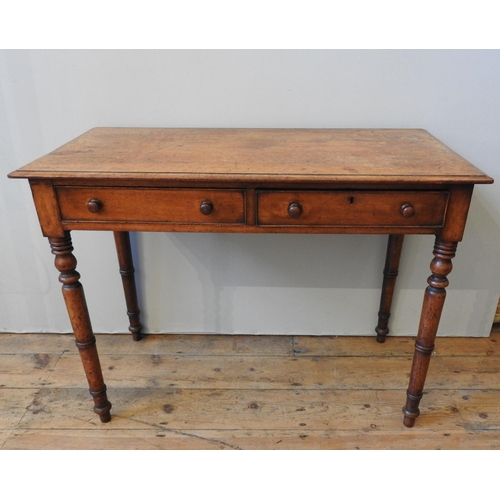 108 - A VICTORIAN MAHOGANY SIDE TABLE, with a moulded rectangular top and two frieze drawers, on four turn... 