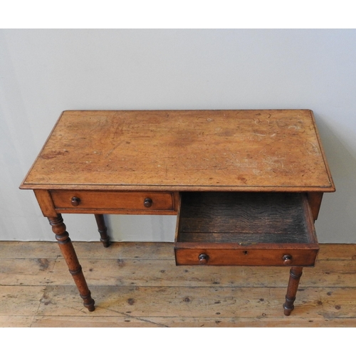 108 - A VICTORIAN MAHOGANY SIDE TABLE, with a moulded rectangular top and two frieze drawers, on four turn... 