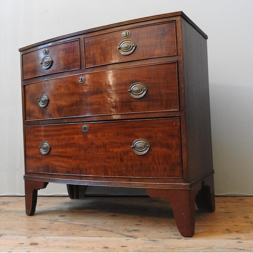 109 - A VICTORIAN MAHOGANY BOW FRONT CHEST OF FOUR DRAWERS, two short drawers over two long drawers on spl... 