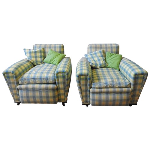 96 - A PAIR OF VINTAGE DEEP SEATED ARMCHAIRS, with back sloping arms, covered in a light blue and lemon y... 