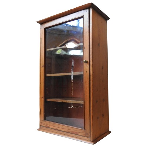 78 - A 19TH CENTURY PINE APOTHECARY CABINET, with glazed door and three interior shelves, 79 x 48 x 26 cm