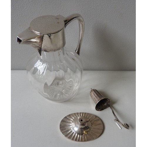 502 - A MAPPIN & WEBB SILVER CANDLE SNUFFER AND WHITE METAL MOUNTED GLASS JUG, the snuffer marked Shef... 