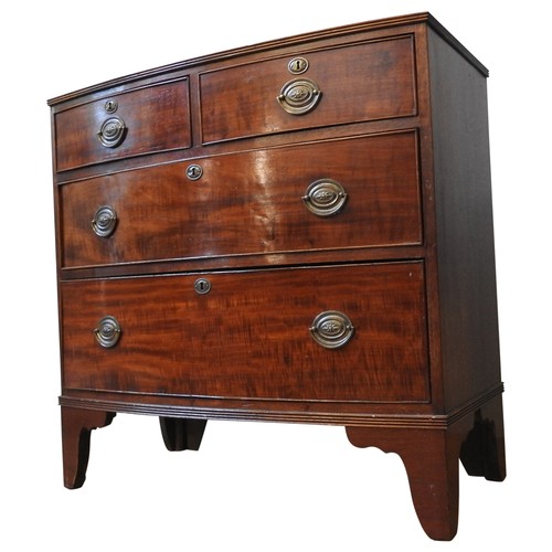 109 - A VICTORIAN MAHOGANY BOW FRONT CHEST OF FOUR DRAWERS, two short drawers over two long drawers on spl... 