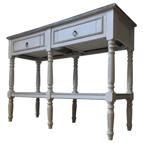 107 - A CONTEMPORARY CHALK PAINTED SIDE TABLE, a limed grain top above two frieze drawers, the six turned ... 