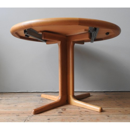 513 - A LAURITS M. LARSEN DANISH TEAK CENTRE PEDESTAL DINING TABLE, with interlocking pedestal base, and p... 