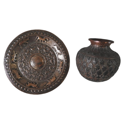 514 - INDIAN REPOUSSE WORK SILVERED COPPER DISH and an Indian copper vase ornately decorated with silvered... 