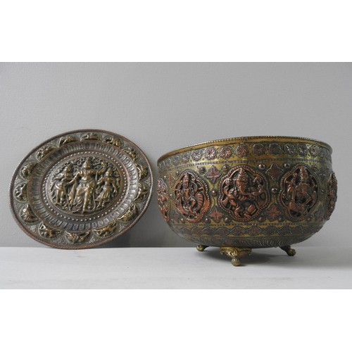 515 - INDIAN BRASS AND COPPER BOWL, decorated with a repeating frieze of deities including Ganesh, probabl... 