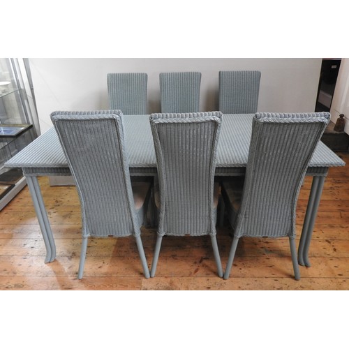 99 - A PALE BLUE LLOYD LOOM TABLE AND SIX MATCHING HIGH BACK CHAIRS, the chairs with maker's brass tags a... 